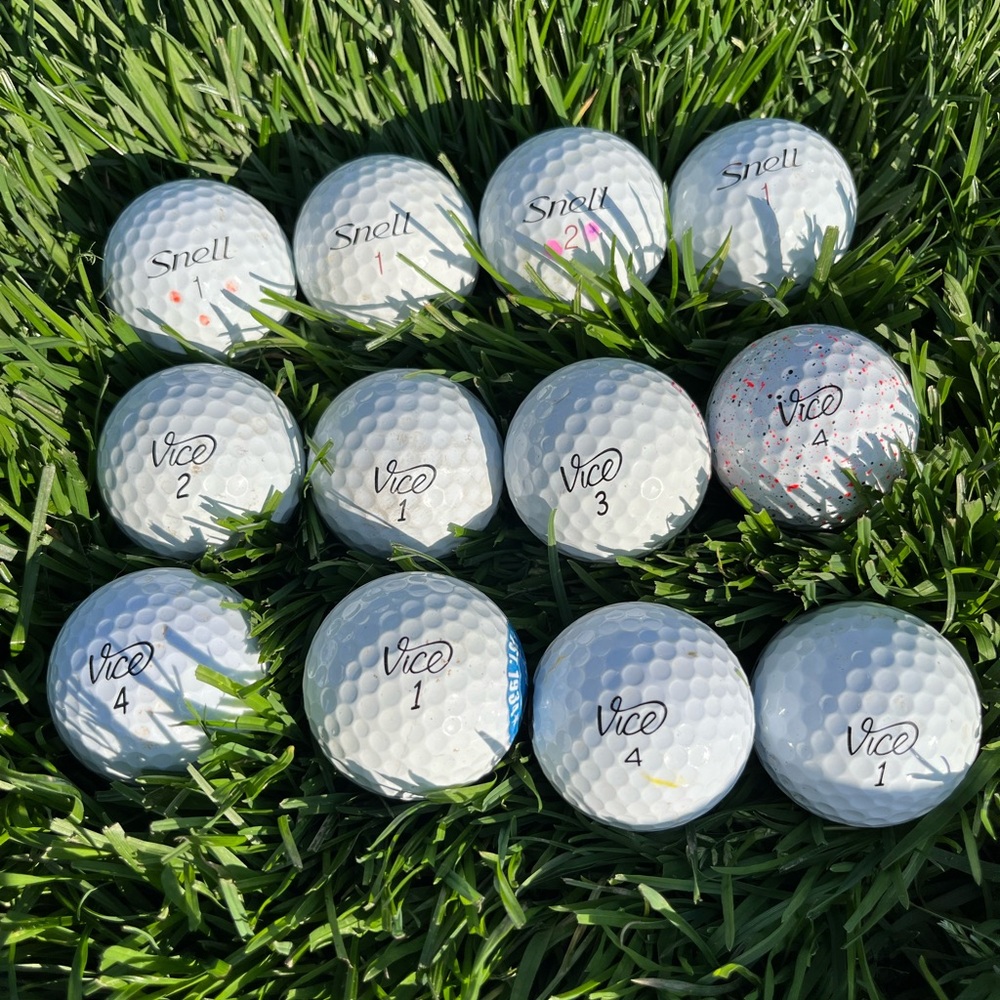 12 Snell and Vice golf balls